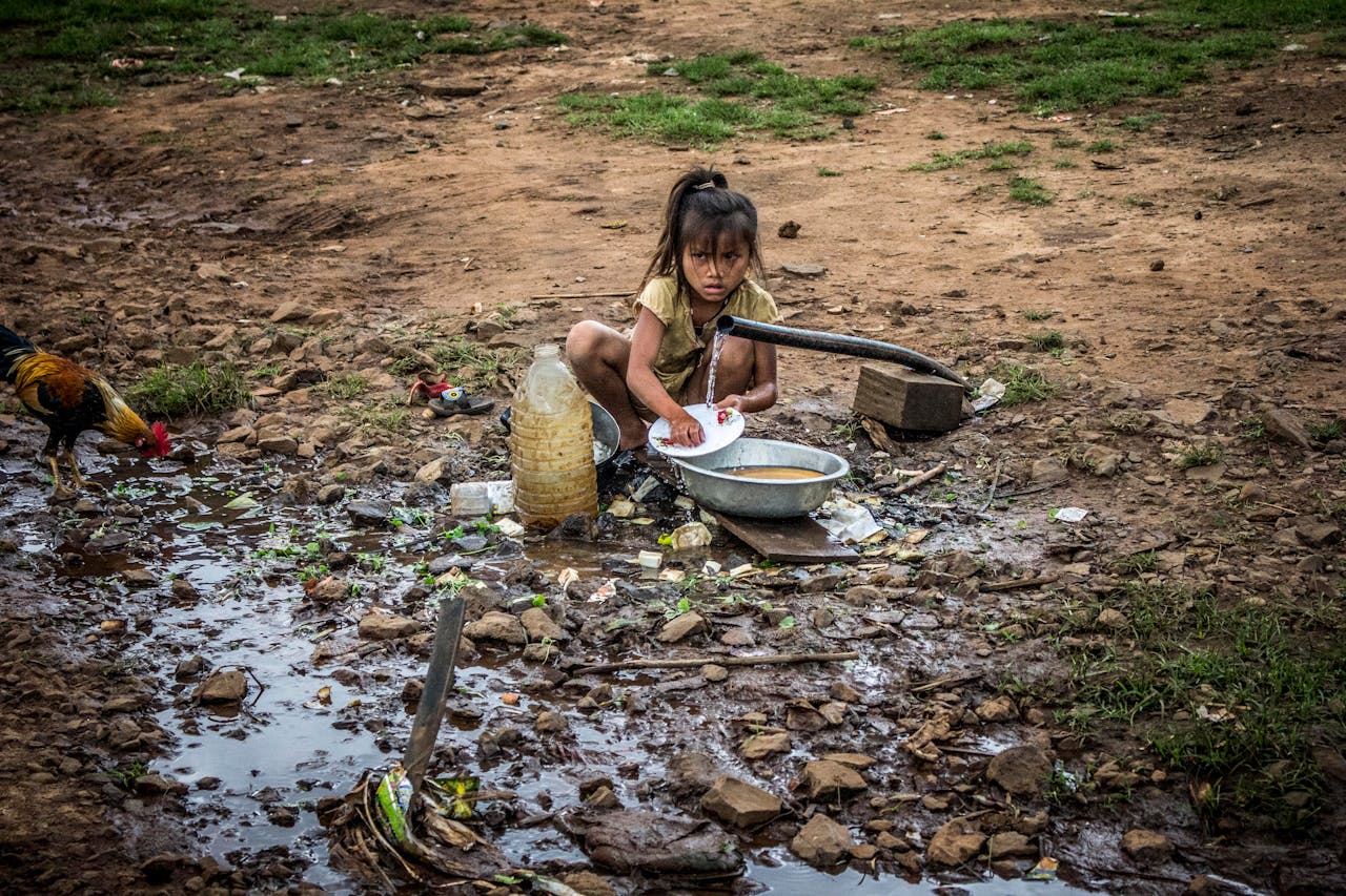A Girl Washing Dishes