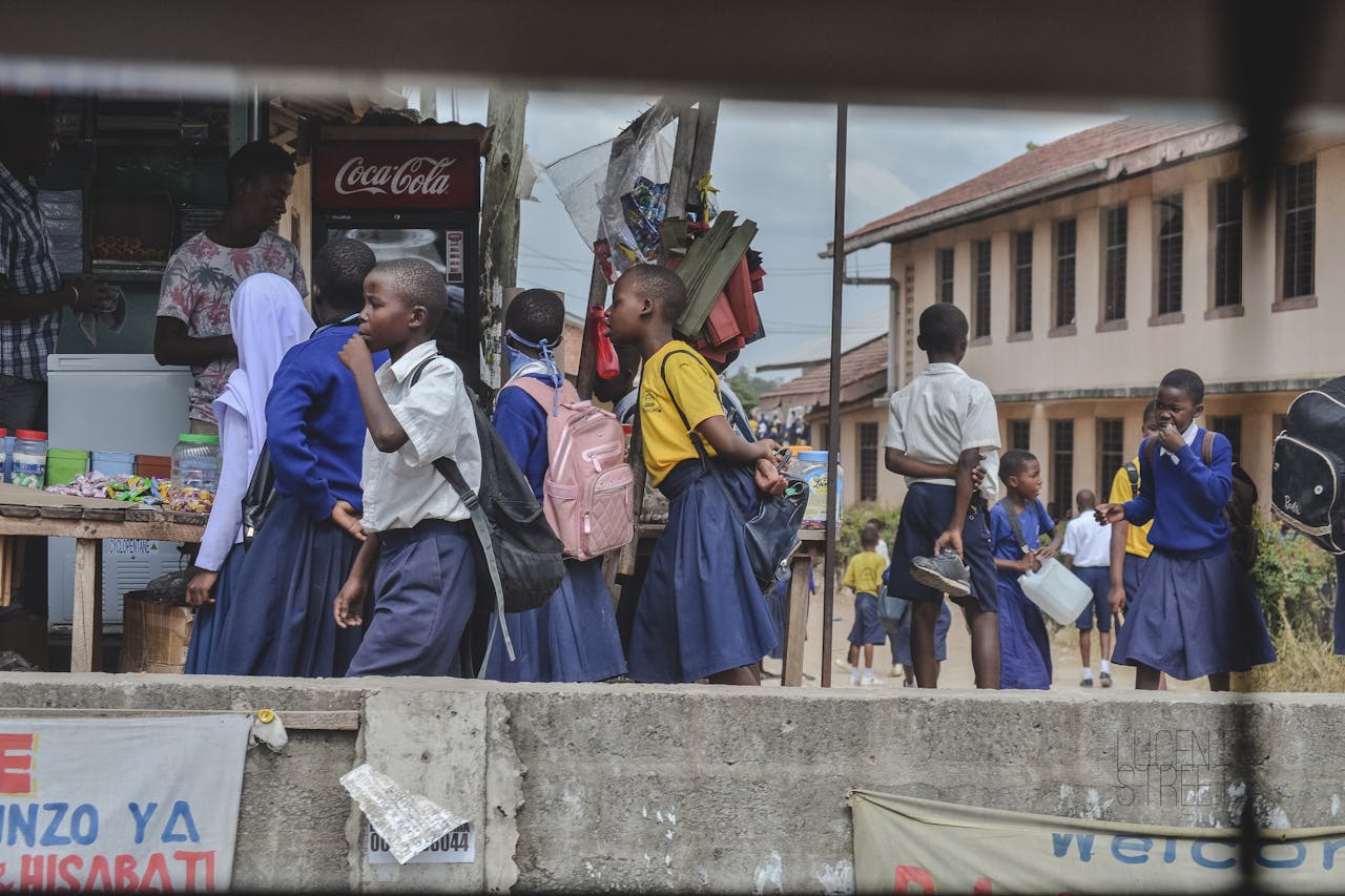 Students Socializing Near a Kiosk